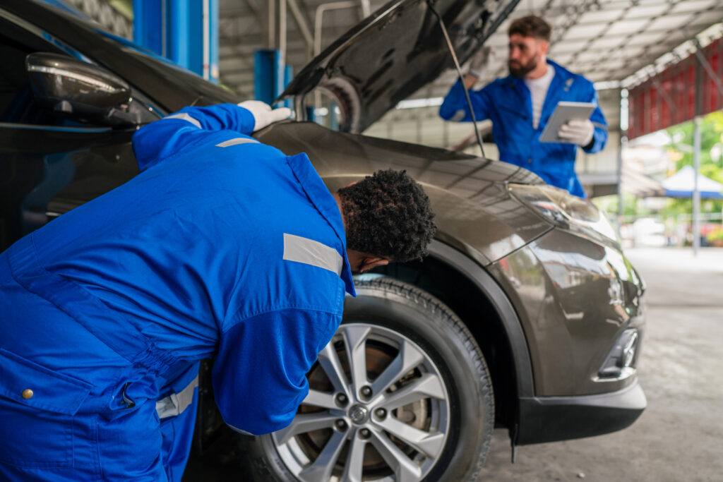 Team Auto Mechanic Are Checking And Repair Maintenance Auto Engi