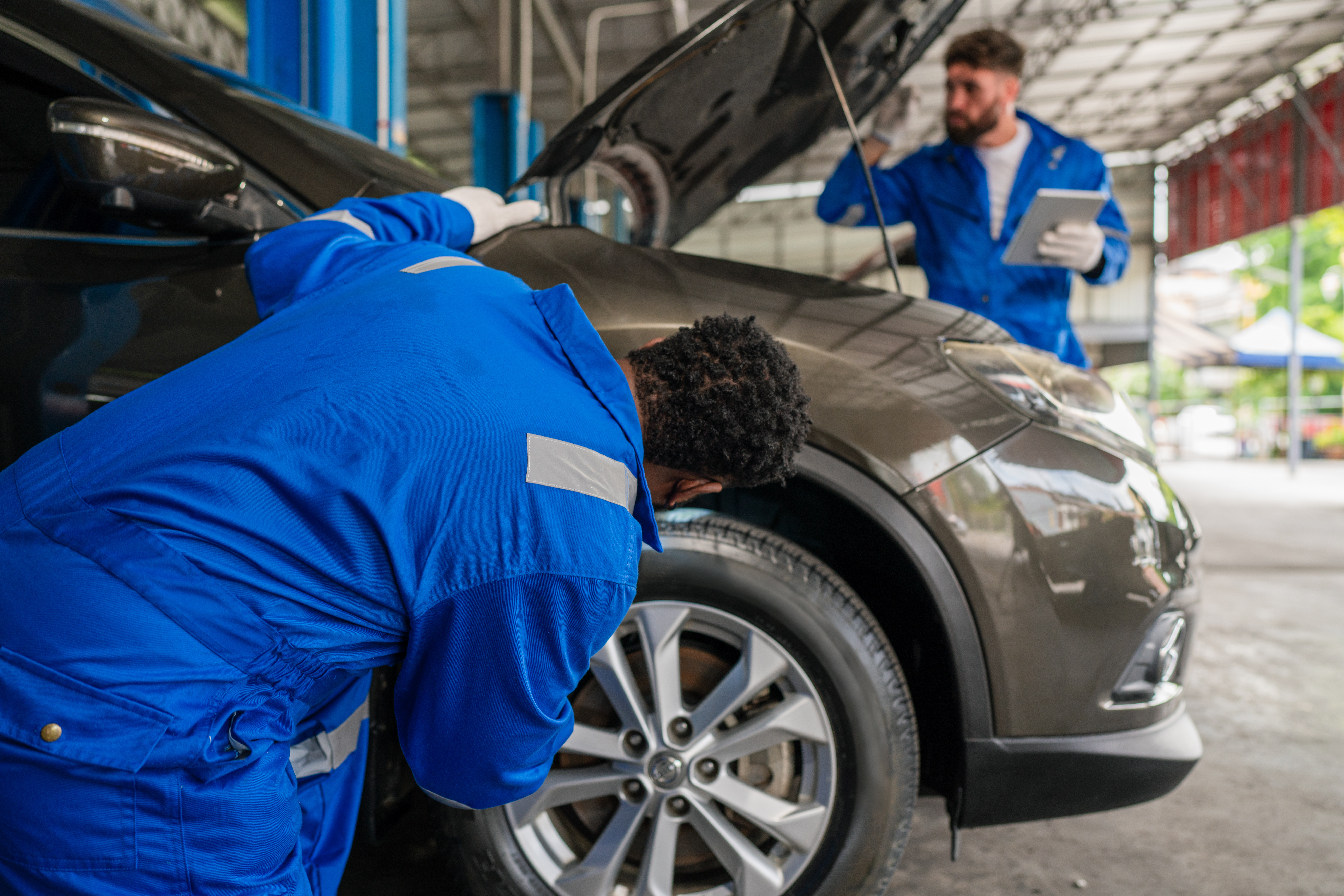 Team Auto Mechanic Are Checking And Repair Maintenance Auto Engi